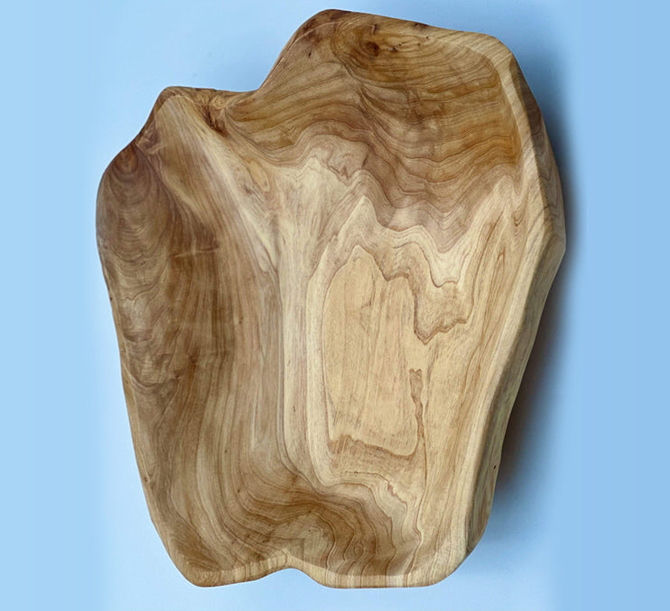 Handcrafted cedar live edge bowls showcasing the unique grain and organic character of solid cedar wood.