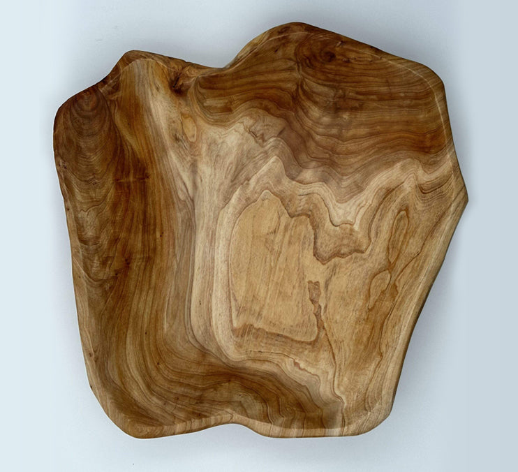 Handcrafted cedar live edge bowls showcasing unique grain patterns and smooth finish.