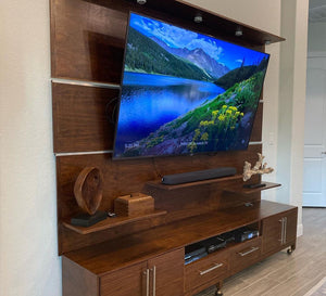 Walnut Entertainment Center – Handcrafted Media Console featuring modern design and spacious storage.