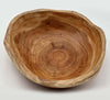 Handcrafted cedar live edge bowls showcasing unique grain patterns and natural warmth.