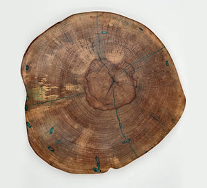 Pecan live edge lazy susan showcasing the unique grain patterns and natural contours of solid wood.