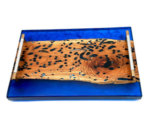 Live Edge Epoxy Tray, Ocean Blue showcasing unique wood grain filled with ocean blue epoxy.