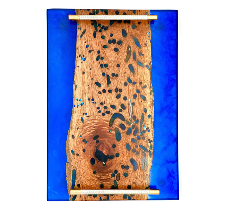 ocean blue live edge epoxy tray with natural wood grain and deep blue epoxy details