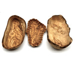 Handcrafted olive wood bowls, beautifully carved with unique patterns and natural textures, perfect for salads and fruit.